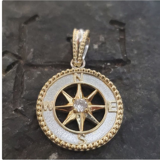 Sterling silver and 14kt gold overlay compass pendant with white sapphire