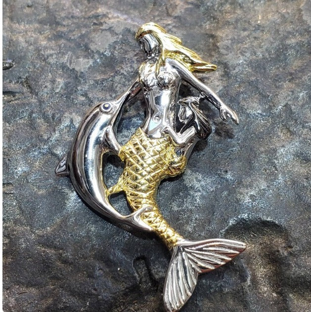 Mermaid with dolphin pendant