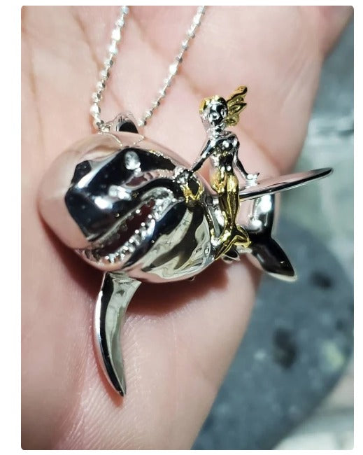 Mermaid riding a shark pendant